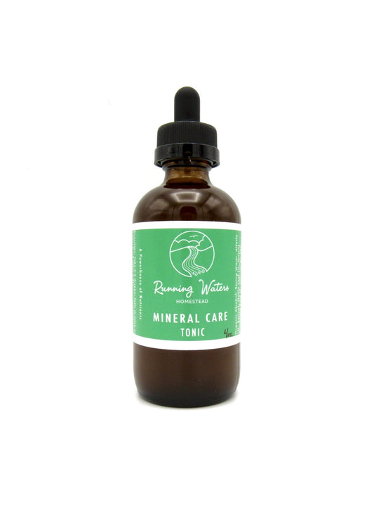 A bottle of Mineral Care Tonic with a dropper, labeled as a product of Running Water.
