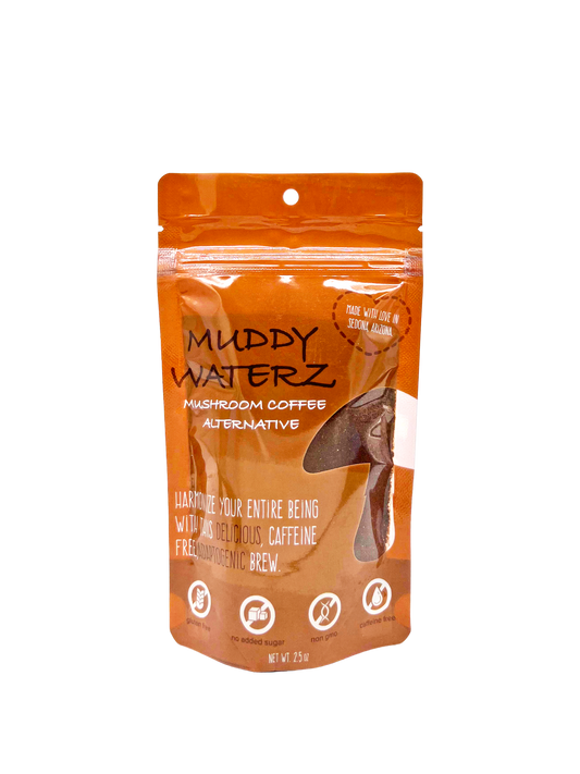 An orange resealable pouch of Muddy Waterz Mushroom Coffee Alternative, featuring a clear window showing the brown coffee inside, set against a plain white background.
